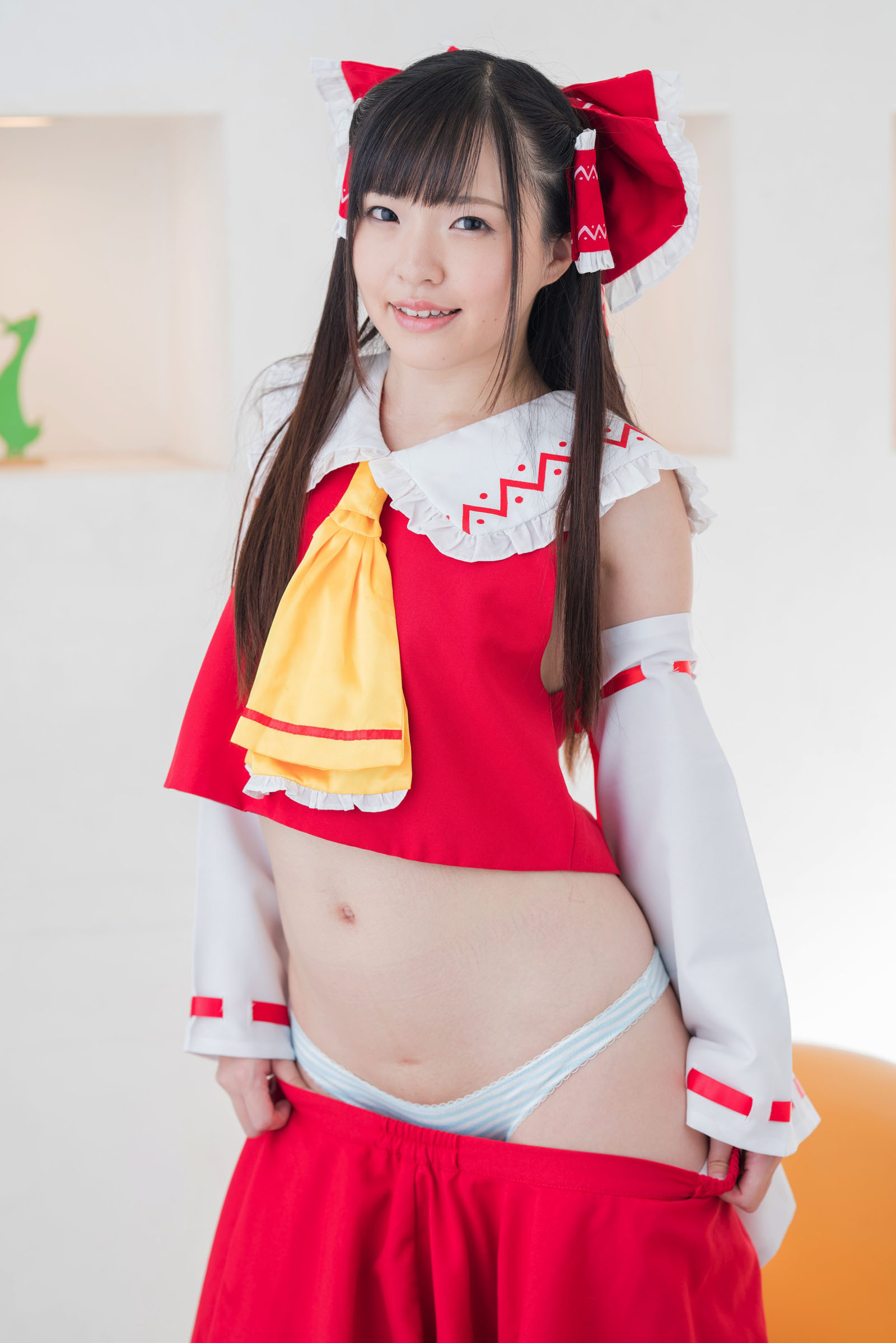 The attractive Japanese cosplayer slightly reveals her flat chest(30)