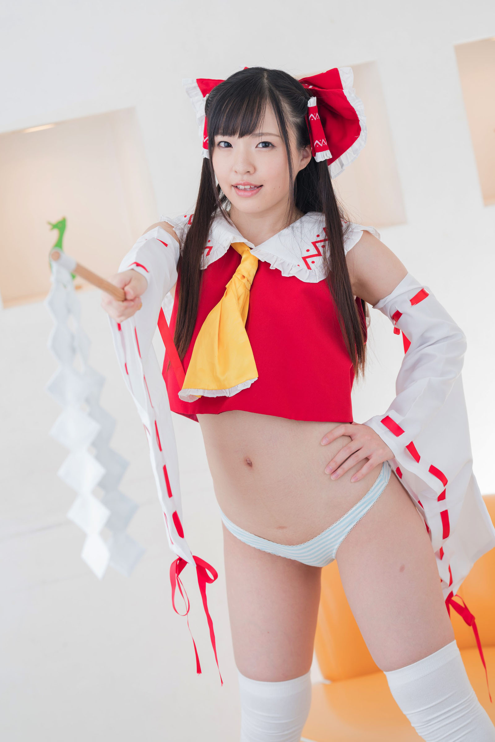 The attractive Japanese cosplayer slightly reveals her flat chest(35)