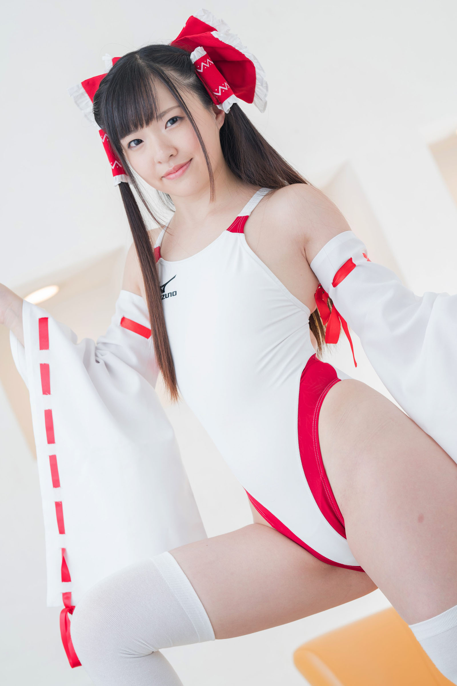 The attractive Japanese cosplayer slightly reveals her flat chest(57)